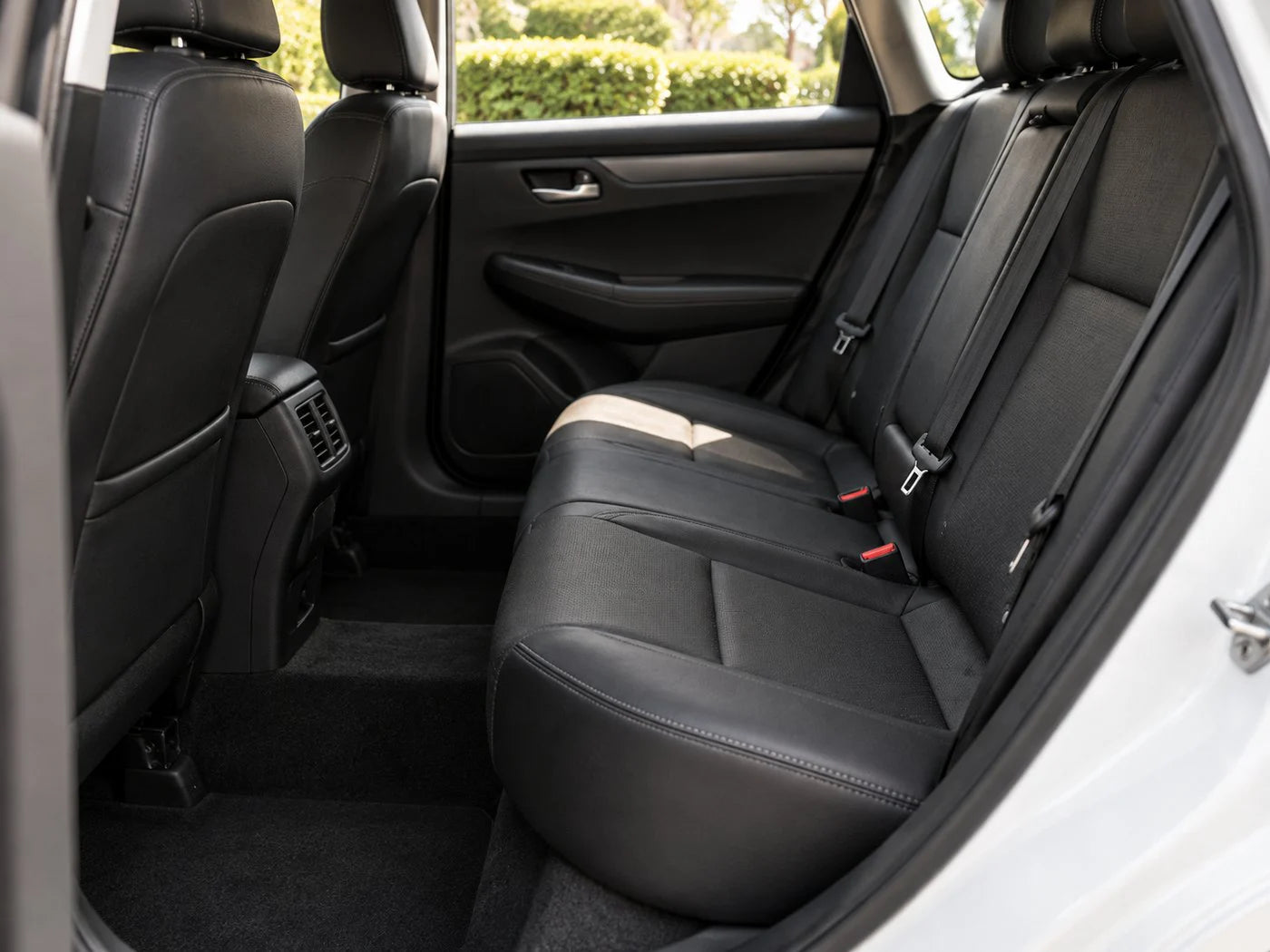 A normal rear bench seat with no hammock fitted and the footwell open